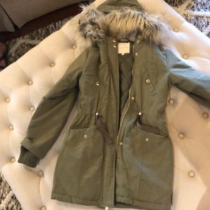 Knee length winter coat faux fur hood.